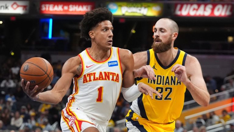 Atlanta Hawks' Jalen Johnson (1) goes to the basket against Indiana Pacers' Jay Huff (32) during the second half of an NBA Cup basketball game, Friday, Oct. 31, 2025, in Indianapolis. (Darron Cummings/AP Photo)