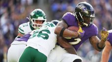Henry rushes for two TDs to help Ravens past Jets for fifth straight win
