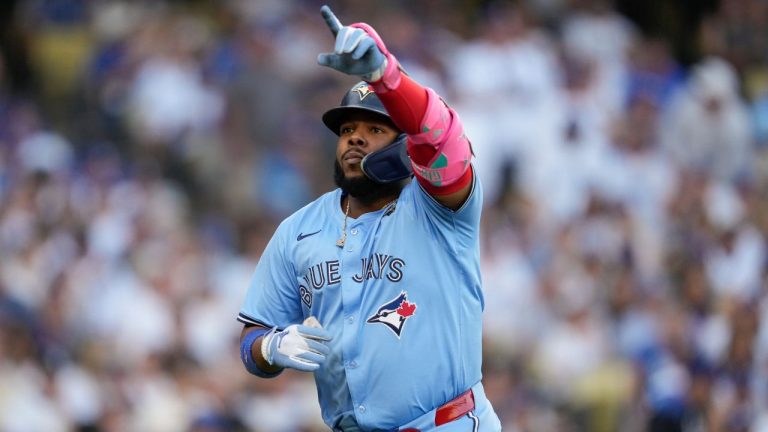 Toronto Blue Jays' Vladimir Guerrero Jr. celebrates his solo home run during the first inning in Game 5 of baseball's World Series against the Los Angeles Dodgers, Wednesday, Oct. 29, 2025, in Los Angeles. (Ashley Landis/AP)