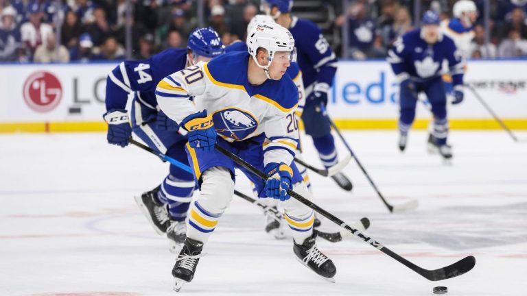 Buffalo Sabres’ Jiri Kulich (20) carries the puck down ice during first period NHL hockey action against the Toronto Maple Leafs in Toronto, Saturday, Oct. 25, 2025. (Nick Iwanyshyn/THE CANADIAN PRESS)