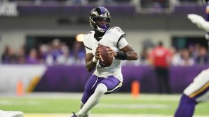 Baltimore Ravens quarterback Lamar Jackson scrambles in the second half of an NFL football game against the Minnesota Vikings, Sunday, Nov. 9, 2025, in Minneapolis. (Abbie Parr/AP)
