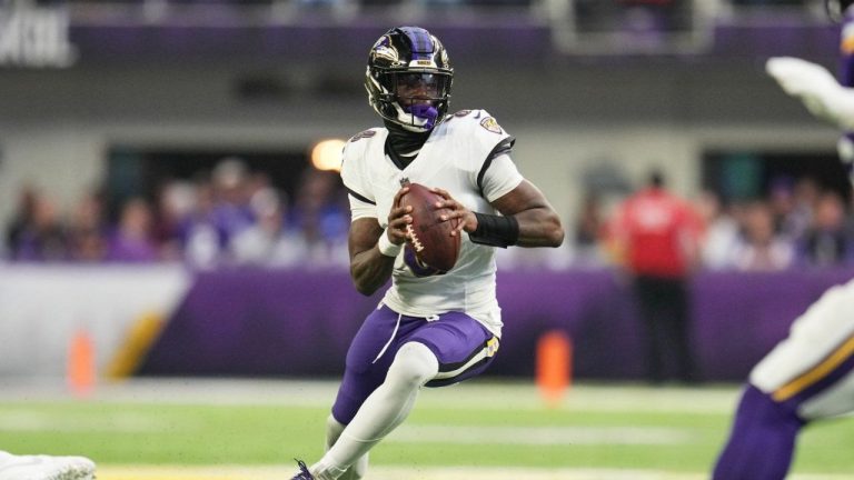 Baltimore Ravens quarterback Lamar Jackson scrambles in the second half of an NFL football game against the Minnesota Vikings, Sunday, Nov. 9, 2025, in Minneapolis. (Abbie Parr/AP)
