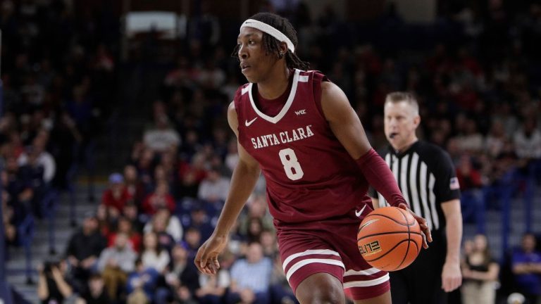 Santa Clara forward Elijah Mahi (8) controls the ball during the first half of an NCAA college basketball game against Gonzaga, Saturday, Jan. 18, 2025, in Spokane, Wash. (Young Kwak/AP Photo)