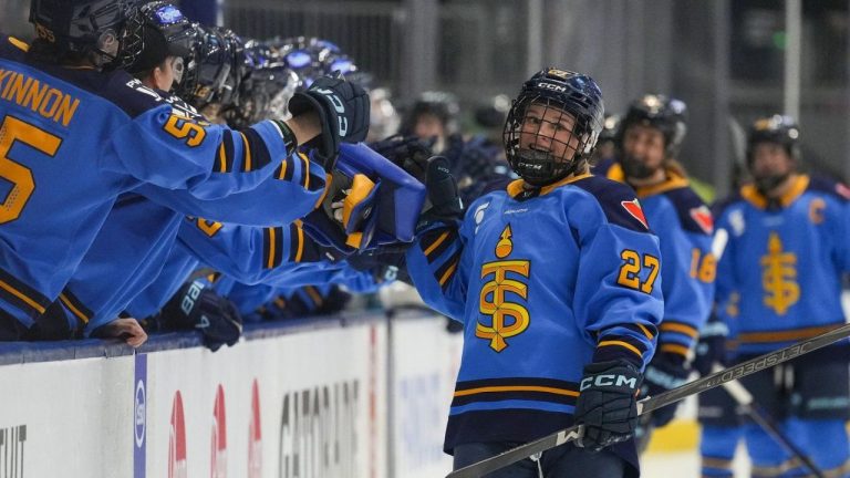 Toronto Sceptres' Emma Maltais (27) is congratulated by her teammates after scoring a goal against the Boston Fleet during first period PWHL hockey action in Toronto on Friday Feb. 14, 2025. (Arlyn McAdorey/CP)