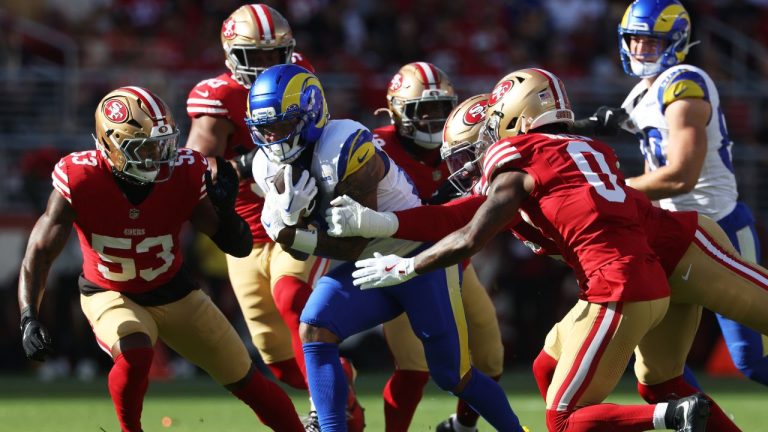 Los Angeles Rams running back Kyren Williams, middle, runs against the San Francisco 49ers during the first half of an NFL football game in Santa Clara, Calif., Sunday, Nov. 9, 2025. (Jed Jacobsohn/AP)
