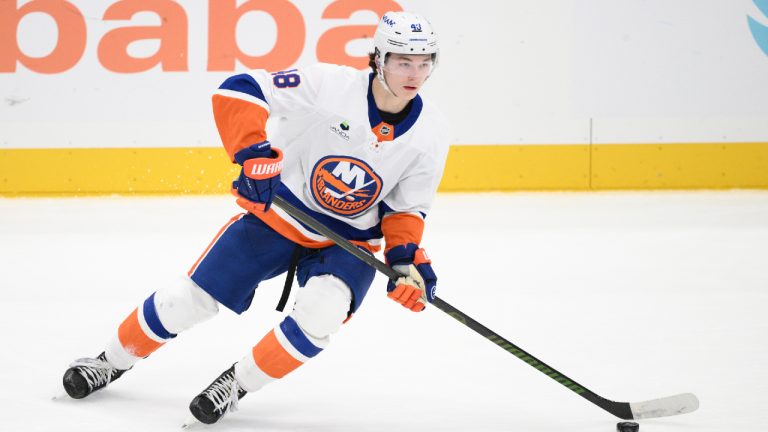 New York Islanders defenceman Matthew Schaefer skates with the puck during the third period of an NHL hockey game against the Washington Capitals, Friday, Oct. 31, 2025, in Washington. (Nick Wass/AP)