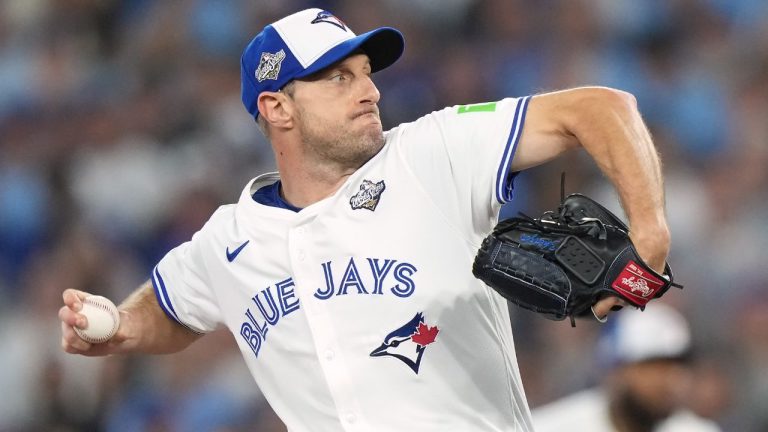 Toronto Blue Jays pitcher Max Scherzer (31) delivers a pitch against the Los Angeles Dodgers during first inning Game 7 World Series playoff MLB baseball action in Toronto on Saturday, Nov. 1, 2025. (Nathan Denette/CP)