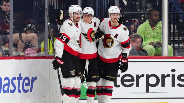 Ottawa Senators' Tim Stützle, centre, celebrates his game wining goal with Drake Batherson (19) and Thomas Chabot (72) during overtime in an NHL hockey game against the Philadelphia Flyers, Saturday, Nov. 8, 2025, in Philadelphia. (Derik Hamilton/AP Photo)