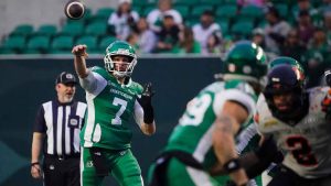 Saskatchewan Roughriders quarterback Trevor Harris (7) throws against the B.C. Lions during the first half of CFL football action in Regina. (Heywood Yu/THE CANADIAN PRESS)
