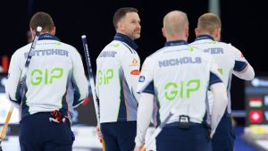 Canada’s Team Brad Gushue (middle left) slides down the ice with his teammates Brendan Bottcher, (far left) Mark Nichols (middle right) and Geoff Walker (far right) after his final Grand Slam of Curling game at the HearingLife Canadian Open on Saturday Dec. 20, 2025, in Saskatoon, Sask. (Anil Mungal/TCG)
