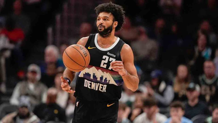 Denver Nuggets guard Jamal Murray controls the ball during the first half of an NBA basketball game against the Charlotte Hornets in Charlotte, N.C., Sunday, Dec. 7, 2025. (Jim Dedmon/AP)