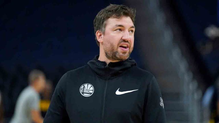 Golden State Warriors assistant coach Chris DeMarco stands before an NBA pre-season basketball game against the Denver Nuggets in San Francisco, Oct. 14, 2022. (Jeff Chiu/AP)