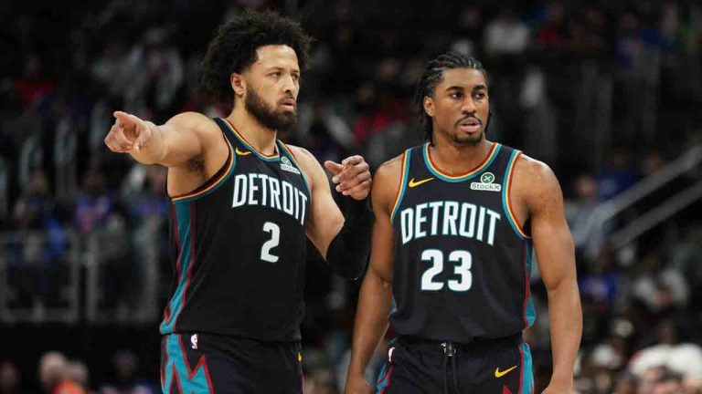 Detroit Pistons guard Cade Cunningham, left, gestures while speaking with guard Jaden Ivey during the second half of an NBA basketball game against the Atlanta Hawks, Monday, Dec. 1, 2025, in Detroit. (Ryan Sun/AP)