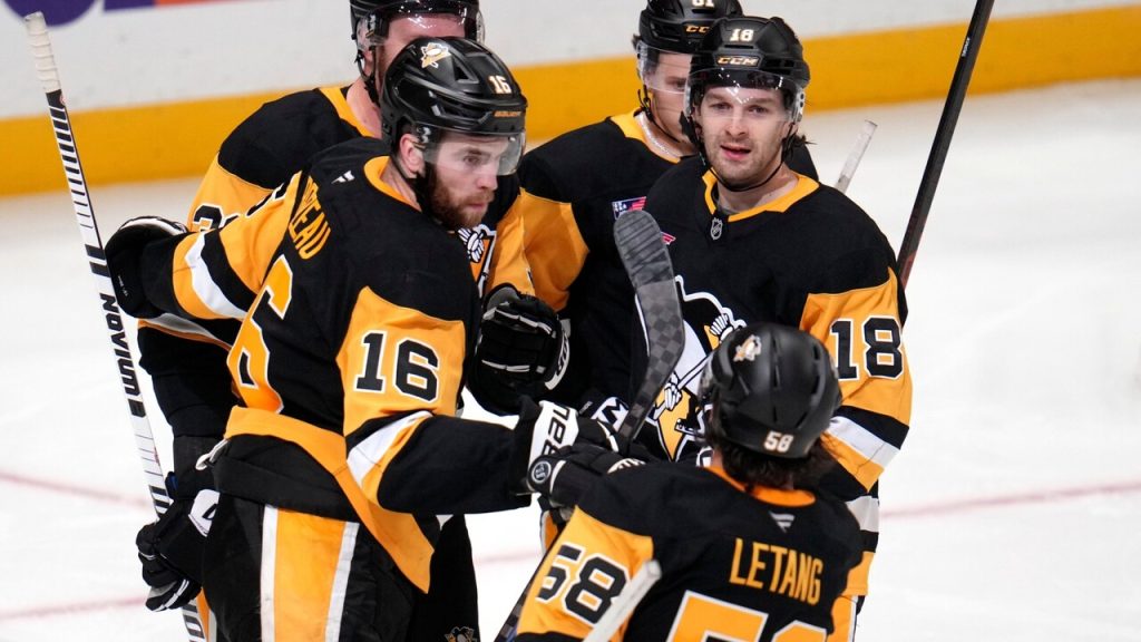 Jonathan Brazeau scoring a breakaway goal while falling.