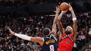 Toronto Raptors forward Brandon Ingram (3) shoots over Denver Nuggets guard Peyton Watson (8) during second half NBA action in Toronto on Wednesday December 31, 2025. (Frank Gunn/CP)