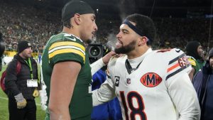 Green Bay Packers quarterback Jordan Love, left, embraces Chicago Bears quarterback Caleb Williams (18) after an NFL football game Sunday, Dec. 7, 2025, in Green Bay, Wis. (Morry Gash/AP)