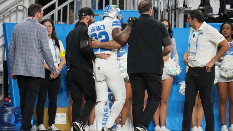 Detroit Lions safety Brian Branch leaves the field with trainers during the second half of an NFL football game against the Dallas Cowboys Thursday, Dec. 4, 2025, in Detroit. (Paul Sancya/AP)