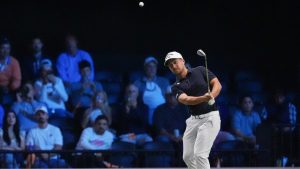 Xander Schauffele of New York Golf Club watches his shot on the green on the 12th hole during the inaugural match of the TGL, against The Bay Golf Club, Tuesday, Jan. 7, 2025, in Palm Beach Gardens, Fla. (Rebecca Blackwell/AP)
