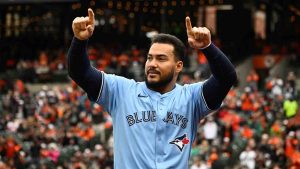 Toronto Blue Jays' Anthony Santander reacts as he was acknowledged during a baseball game against the Baltimore Orioles, Saturday, April 12, 2025, in Baltimore. (Nick Wass/AP)