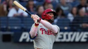 Philadelphia Phillies' Kyle Schwarber watches his home run in the second inning of a baseball game against the Cleveland Guardians in Cleveland, Sunday, May 11, 2025. (Sue Ogrocki/AP)