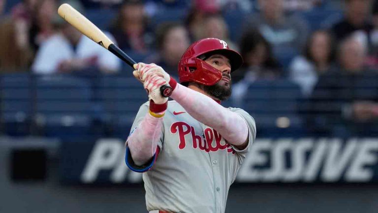 Philadelphia Phillies' Kyle Schwarber watches his home run in the second inning of a baseball game against the Cleveland Guardians in Cleveland, Sunday, May 11, 2025. (Sue Ogrocki/AP)
