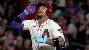 Arizona Diamondbacks' Ketel Marte reacts after hitting a solo home run in the first inning of a baseball game against the Houston Astros, Wednesday, July 23, 2025, in Phoenix. (Rick Scuteri/AP)