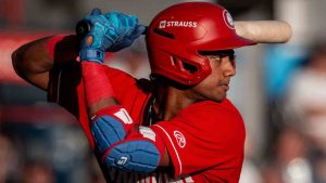 Vancouver Canadians shortstop Arjun Nimmala bats during the second inning of a Northwest Minor League Baseball game against the Eugene Emeralds in Vancouver on Wednesday, July 23, 2025. (Ethan Cairns/CP)