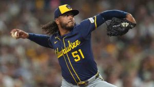 Milwaukee Brewers starting pitcher Freddy Peralta works against a San Diego Padres batter during the first inning of a baseball game Monday, Sept. 22, 2025, in San Diego. (Gregory Bull/AP)