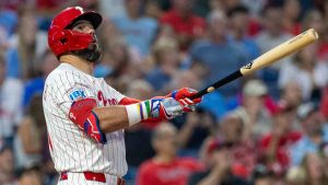 Philadelphia Phillies designated hitter Kyle Schwarber watches the ball after hitting a solo home run in the first inning of a baseball game against the Miami Marlins, Tuesday, Sept. 23, 2025, in Philadelphia. (Laurence Kesterson/AP)