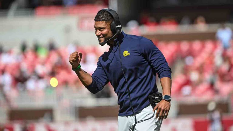 Notre Dame coach Marcus Freeman reacts after a Notre Dame touchdown against Arkansas during the second half of an NCAA college football game Saturday, Sept. 27, 2025, in Fayetteville, Ark. (Michael Woods/AP)