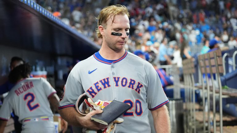 New York Mets' Pete Alonso gathers his belongings in the dugout after the Mets lost to the Miami Marlins in a game, Sunday, Sept. 28, 2025, in Miami. (Lynne Sladky/AP)