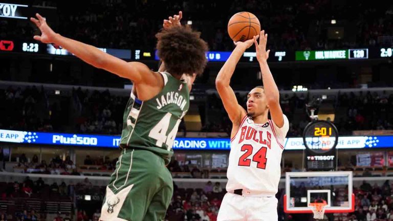 Chicago Bulls forward Noa Essengue (24) shoots the ball over Milwaukee Bucks guard Andre Jackson Jr. (44) during the second half of a preseason NBA basketball game, Sunday, Oct. 12, 2025, in Chicago. (David Banks/AP)