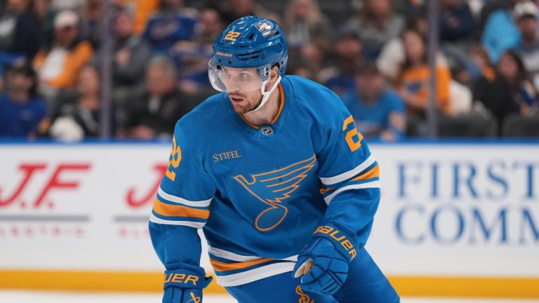 St. Louis Blues' Pius Suter (22) in action during the third period of an NHL hockey game against the Utah Mammoth Thursday, Oct. 23, 2025, in St. Louis. (AP Photo/Jeff Roberson)