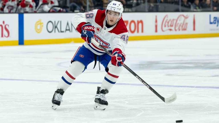 Montréal Canadiens defenceman Lane Hutson passes the puck during the first period of an NHL game against the Utah Mammoth, Wednesday, Nov. 26, 2025, in Salt Lake City. (Anna Fuder/AP)