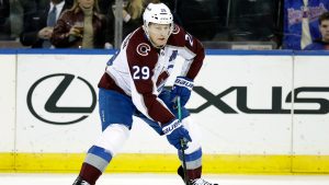Colorado Avalanche centre Nathan MacKinnon with the puck in the second period of an NHL game against the New York Rangers, Saturday, Dec. 6, 2025, in New York. (Adam Hunger/AP)