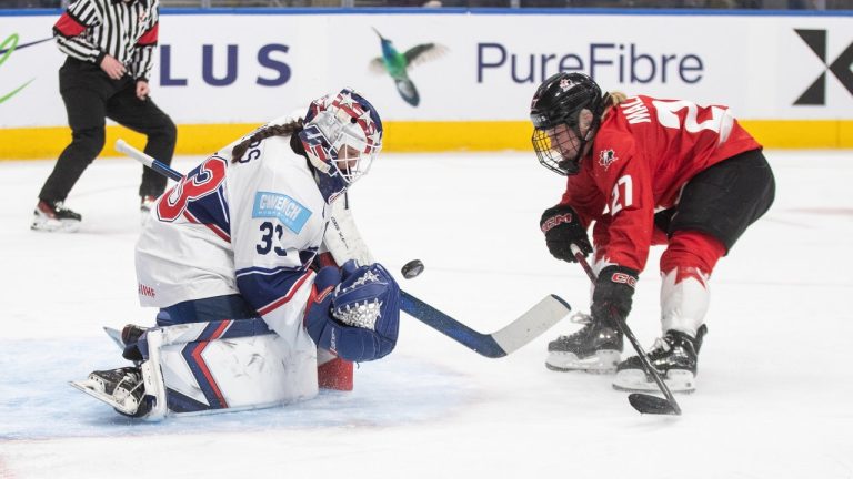 United States goaltender Gwyneth Philips (33) stops Canada's Emma Maltais (27) during third period Rivalry Series action in Edmonton on Wednesday, December 10, 2025. THE CANADIAN PRESS/Jason Franson