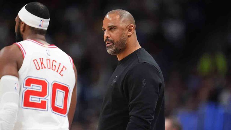 Houston Rockets head coach Ime Udoka, right, confers with guard Josh Okogie (20) in the first half of an NBA basketball game against the Denver Nuggets, Monday, Dec. 15, 2025, in Denver. (David Zalubowski/AP)