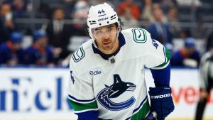 Vancouver Canucks left wing Kiefer Sherwood looks on during the first period of an NHL hockey game against the New York Islanders, Friday, Dec. 19, 2025, in Elmont, NY. (Noah K. Murray/AP)
