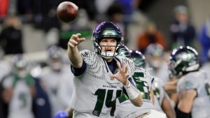 Seattle Seahawks quarterback Sam Darnold (14) makes a pass against the Los Angeles Rams in an NFL football game, Thursday, Dec. 18, 2025, in Seattle. (John Froschauer/AP)