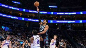 Detroit Pistons forward Tobias Harris (12) shoots over Utah Jazz guard Isaiah Collier (8) during the first half of an NBA basketball game, Friday, Dec. 26, 2025, in Salt Lake City. (Tyler Tate/AP)