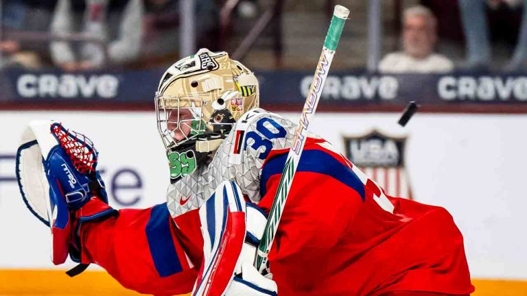 Canada's Zayne Parekh (19), not shown, scores on Czechia goaltender Michal Orsulak (30) during second period IIHF World Junior Championship hockey action, in Minneapolis, Friday, Dec. 26, 2025. (Christopher Katsarov/CP)
