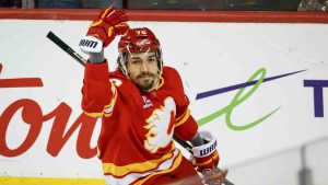 Calgary Flames' Ryan Lomberg celebrates his goal during second period NHL hockey action against the Edmonton Oilers in Calgary, Alta., Saturday, Dec. 27, 2025. (Jeff McIntosh/CP)