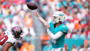 Miami Dolphins quarterback Quinn Ewers (14) passes against the Tampa Bay Buccaneers during the first half of an NFL football game Sunday, Dec. 28, 2025, in Miami Gardens, Fla. (AP Photo/Rebecca Blackwell)