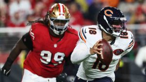 Chicago Bears quarterback Caleb Williams (18) scrambles away from San Francisco 49ers defensive tackle CJ West (99) during the first half of an NFL football game in Santa Clara, Calif., Sunday, Dec. 28, 2025. (Jed Jacobsohn/AP)