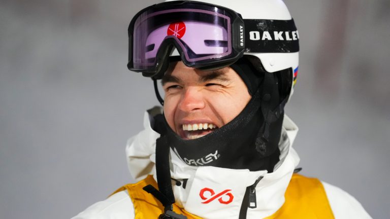Canada's Mikael Kingsbury laughs after winning the men's World Cup freestyle skiing dual moguls in Saint-Come, Que., Saturday, Feb. 1, 2025. (Sean Kilpatrick/CP)