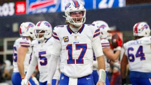 Buffalo Bills quarterback Josh Allen reacts after a touchdown during the second half of an NFL game against the New England Patriots, Sunday, Dec. 14, 2025, in Foxborough, Mass. (Greg M. Cooper/AP)