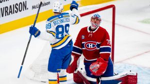 St. Louis Blues' Pavel Buchnevich (89) celebrates after scoring on Montreal Canadiens goaltender Jakub Dobes (75) during second period NHL hockey action in Montreal on Sunday, Dec. 7, 2025. (Christopher Katsarov/CP)