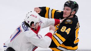 Boston Bruins left wing Tanner Jeannot (84) fights against Montreal Canadiens right wing Josh Anderson, left, during the first period of an NHL hockey game, Tuesday, Dec. 23, 2025, in Boston. (Charles Krupa/AP)