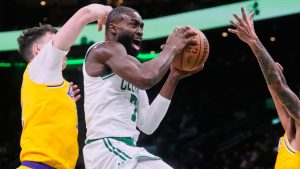 Boston Celtics guard Jaylen Brown (7) drives to the basket against the Los Angeles Lakers during the first half of an NBA basketball game, Friday, Dec. 5, 2025, in Boston. (Charles Krupa/AP)