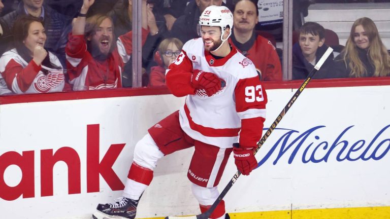 Detroit Red Wings' Alex DeBrincat celebrates his goal against the Calgary Flames during first period NHL hockey action in Calgary on Wed., Dec. 10, 2025. (Larry MacDougal/CP)